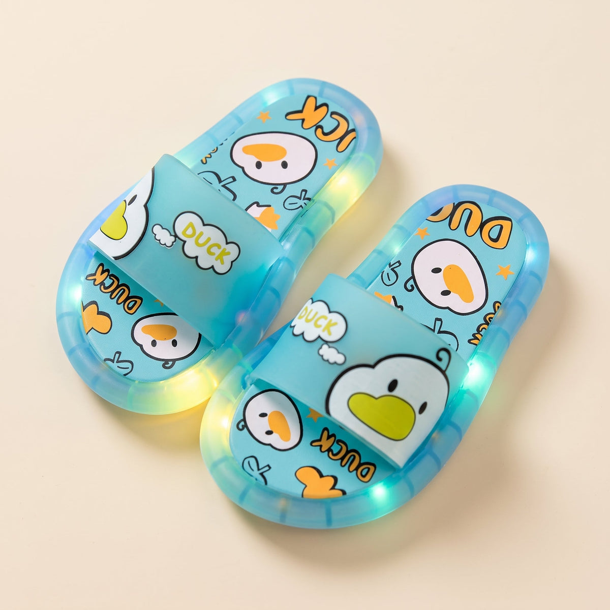 Chaussons lumineux design Duck turquoise — Plume & Lune