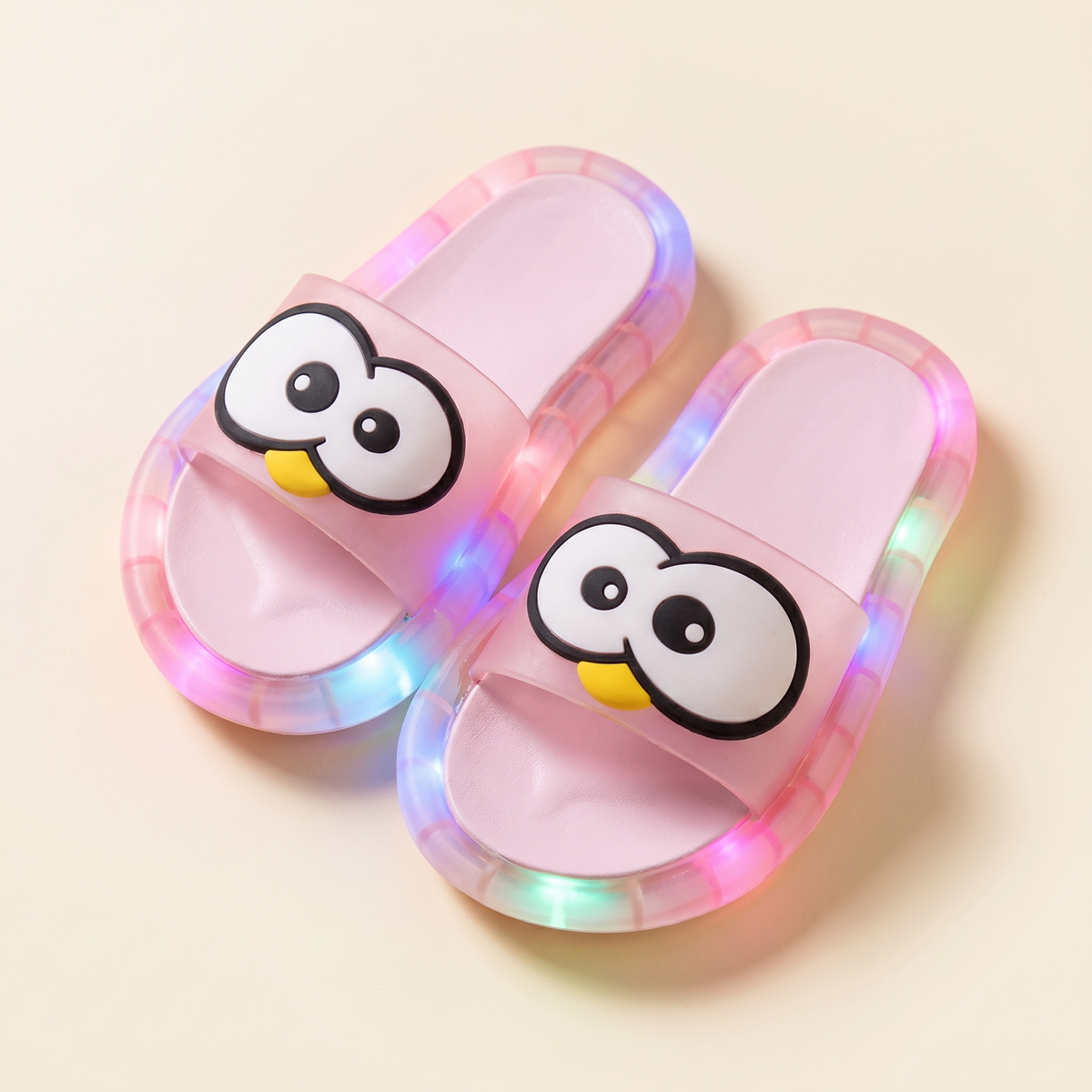 Claquettes lumineuses adulte Gros Yeux rose — Plume & Lune